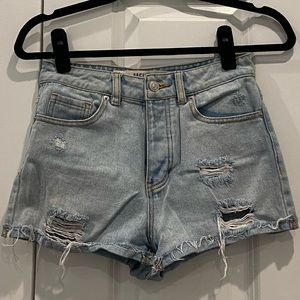 Brandy Melville ripped jean shorts. Size 25.